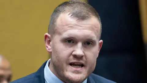 Ian Cameron: South African MP fends off attack by gang during attempted hijacking